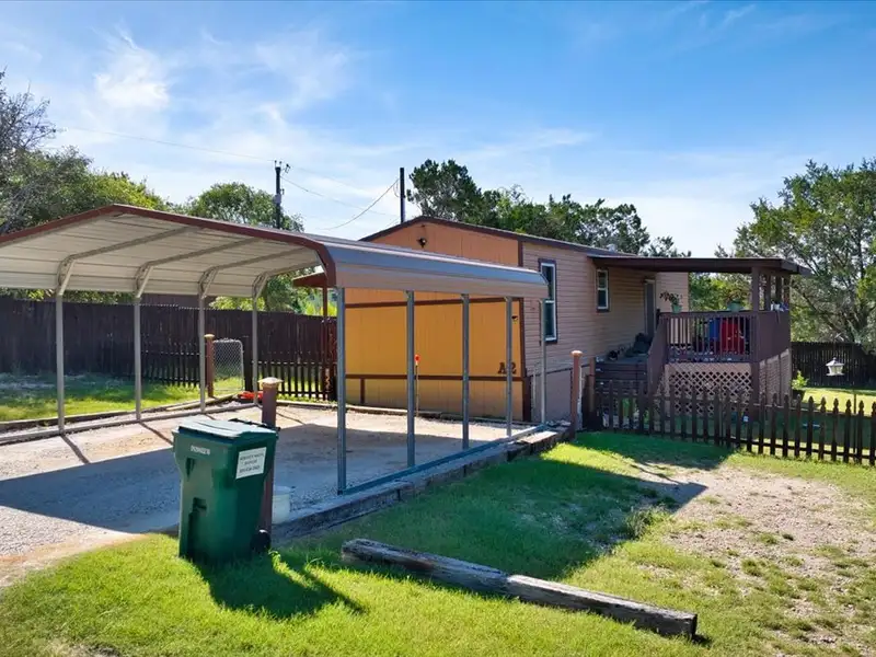 10-acre Mobile Home Community with 5 Units, Fenced, Workshop, and Growth Potential