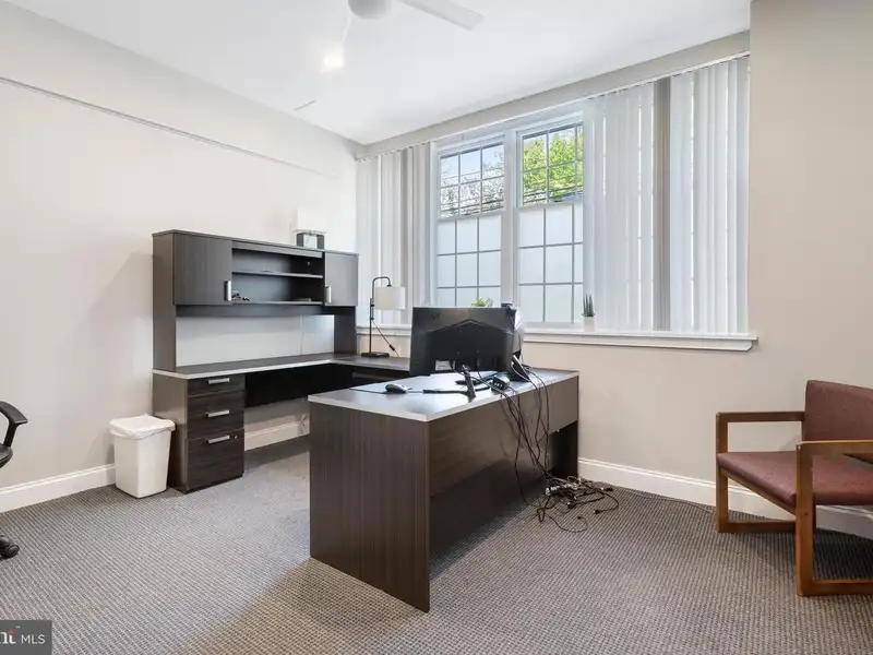 Historic 1921 Office Building in Wallingford with Ample Parking and Strong Investment Potential