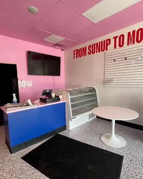 Turnkey 1,600 Sq Ft Retail Space with Kitchen Hood and Ample Parking in Prime Location