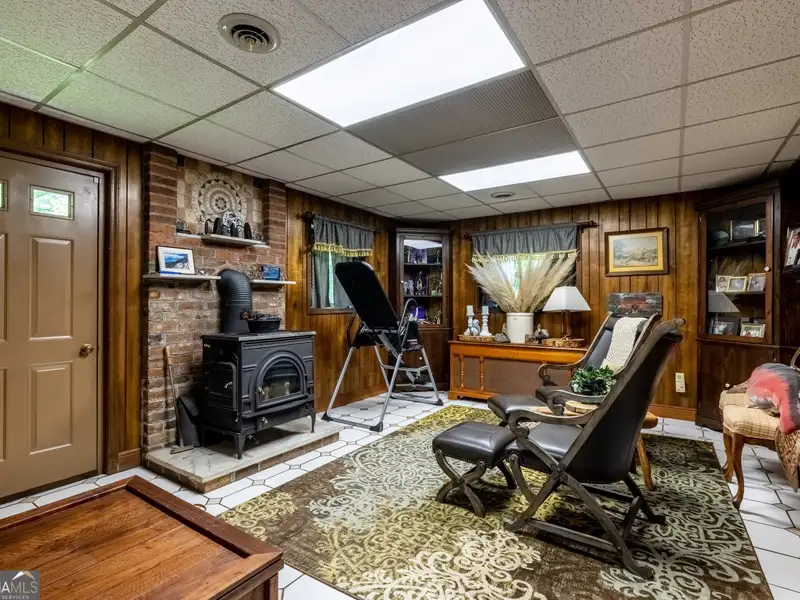 27 Acres with 2,400 Sq. Ft. Home, Duplexes, Pool, and Barn in Prime Location