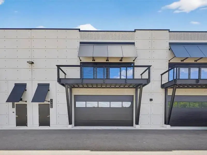 Exclusive Balcony Unit at the Motor Enclave with Private Garage and Racetrack Views