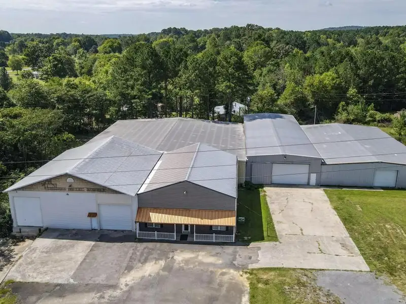 Commercial Property on Busy Highway - 2.1 Acres, 31,000 Sq Ft with Offices and Roll-up Doors