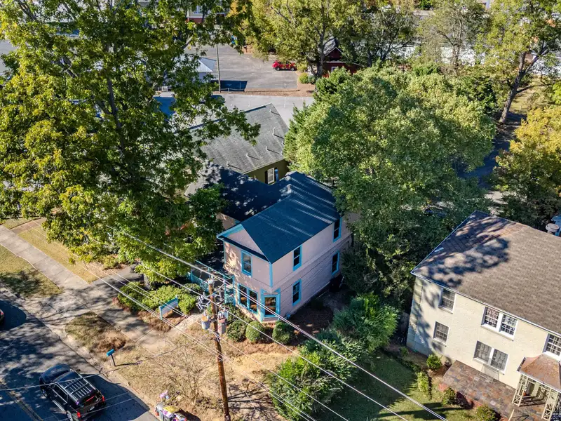 Versatile Commercial Building Near Downtown with Parking and Apartment Potential