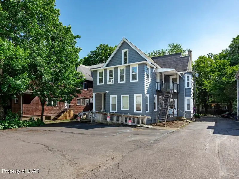 Versatile Office Building in Central Kingston with Multiple Offices and Ample Parking