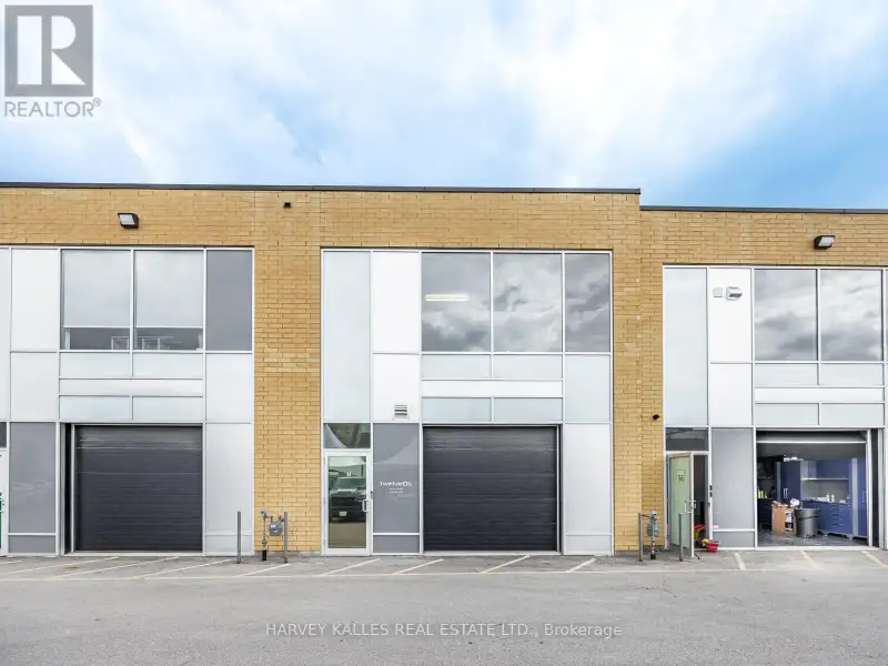 Fully Leased Commercial Condo in Prime Location on the Queensway