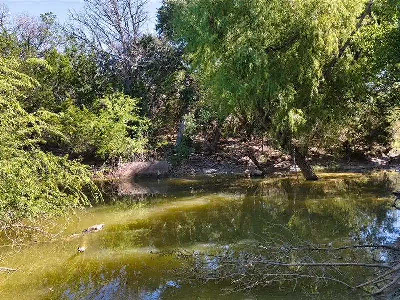 10-acre Mobile Home Community with 5 Units, Fenced, Workshop, and Growth Potential