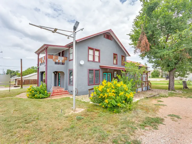 Historic Two-story Commercial Building with Garage Loft Apartment in Prime Location