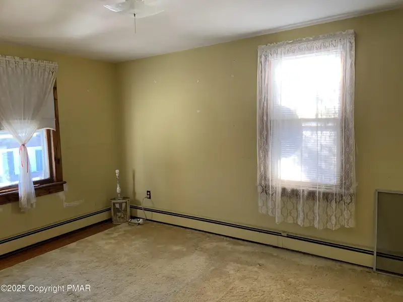Prime 2-acre Commercial Property with 3-bedroom Home in High Traffic Area