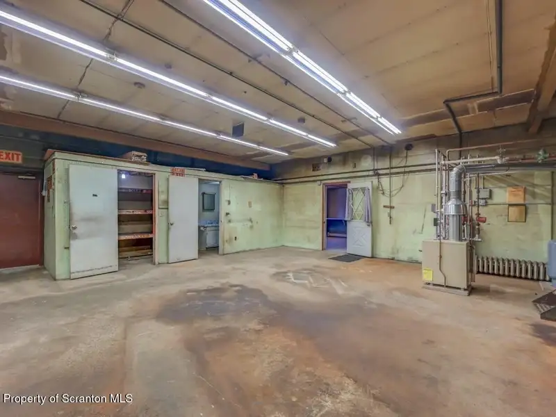 Mixed-use Property in Throop: 7-bay Garage and Updated 2-bedroom Apartment