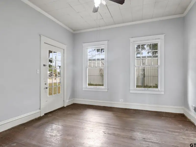Prime Commercial Property with Building and Home on Half Acre Lot