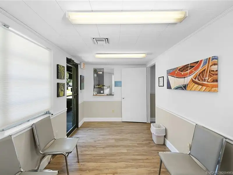Versatile Office Building with Therapy Rooms and Break Area in R-3a Zoning