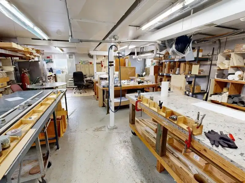 Turnkey Custom Plastics Manufacturing Business with Attached Home on 1.67 Acres