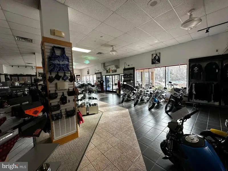 Versatile Commercial Property with Showroom, Offices, and Large Metal Building in Prime Location