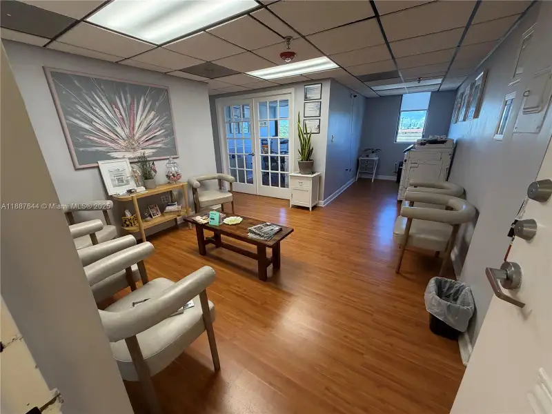 Well-maintained Office Space Near Coral Gables with Natural Light and Three Private Rooms