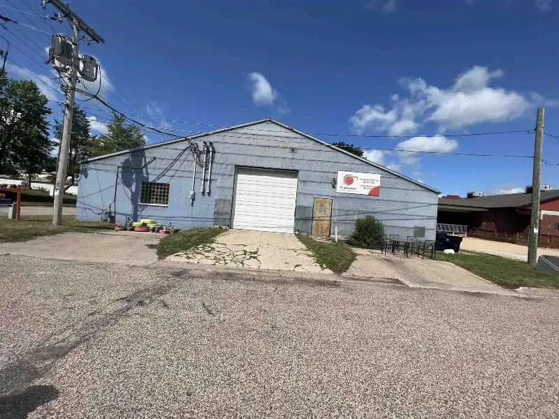 Versatile Mixed-use Property with Office Space and Storage in Residential Area