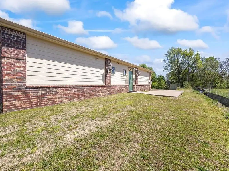 Versatile 2,752 Sq Ft Office Building in Central Rogers with Five Private Offices