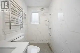 Renovated 2nd Floor Condo in Mid-town Toronto with Luxury Finishes and Modern Amenities