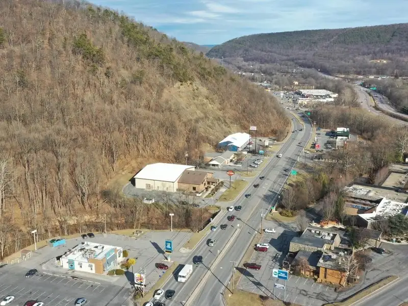 Versatile Commercial Property with Showroom, Offices, and Large Metal Building in Prime Location