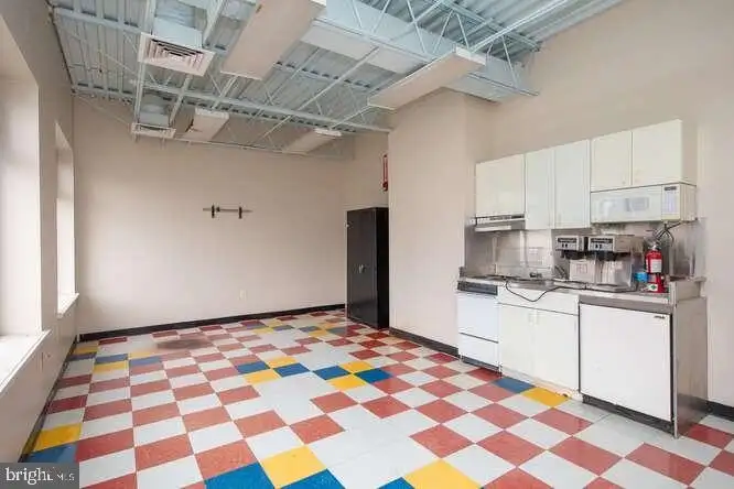Versatile 6,000 Sq Ft Commercial Space in Prime Location with Parking Potential