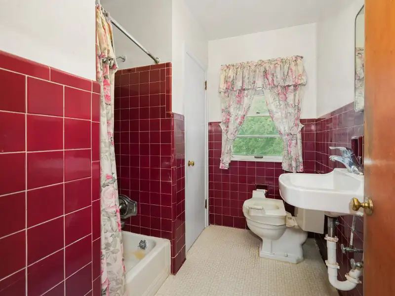 Prime 2.58-acre Multifunctional Property with Ranch Home and Outbuildings Near High-traffic Area