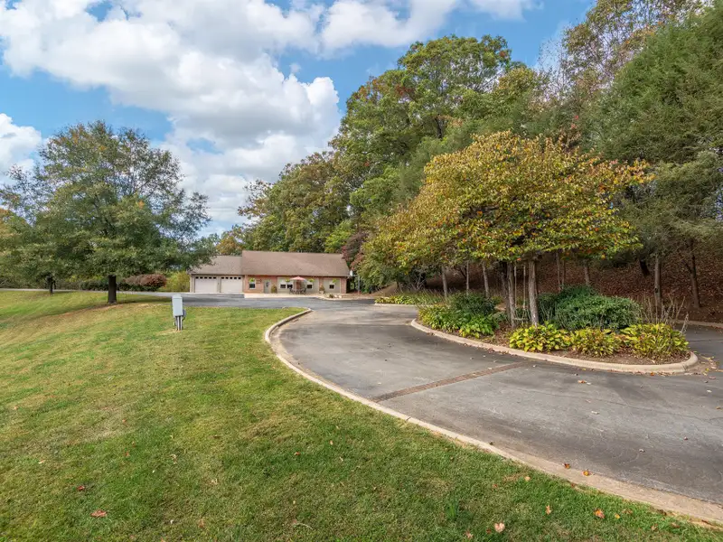 Multi-use Property on 16+ Acres with Home, Barndominium, Pond, and Pool in Western Nc