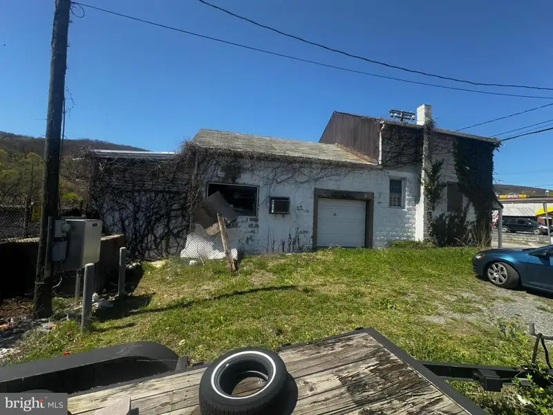 Large Commercial Building with Unique Floor Plan and Adjacent City-owned Lot for Sale