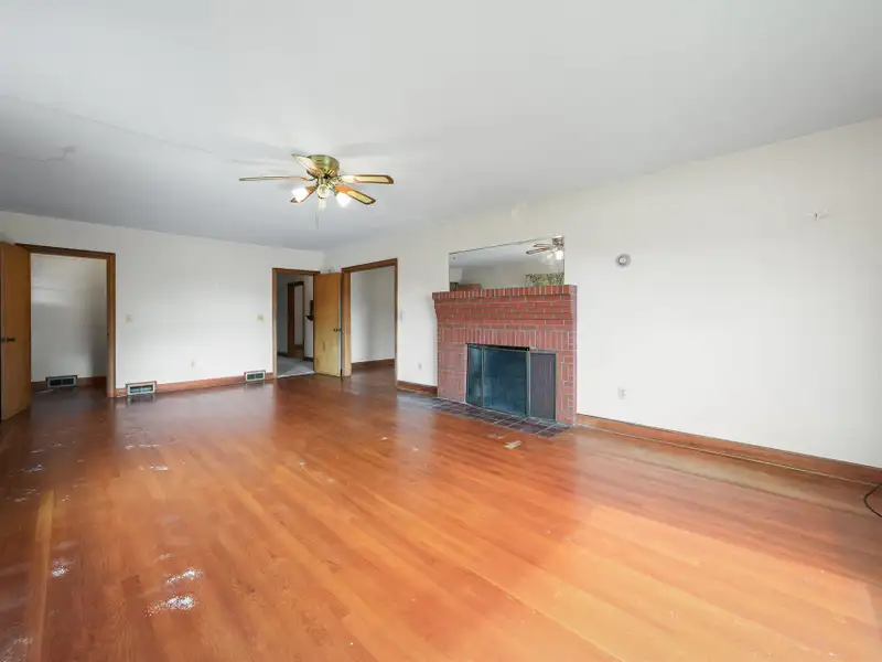 Prime 2.58-acre Multifunctional Property with Ranch Home and Outbuildings Near High-traffic Area