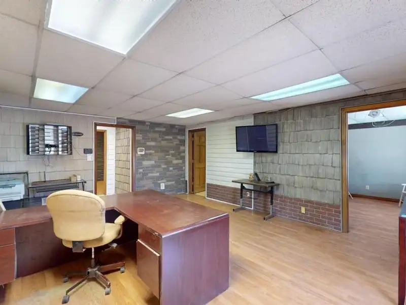 Commercial Property on Busy Highway - 2.1 Acres, 31,000 Sq Ft with Offices and Roll-up Doors