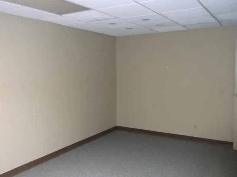 Remodeled 8420 Sf Office Building on Commercial Street, Neenah with Ample Parking and Facilities