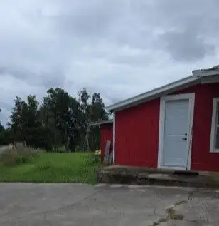 Commercial Property with Living Space Near Beaver Lake, Zoned and Ready for Development
