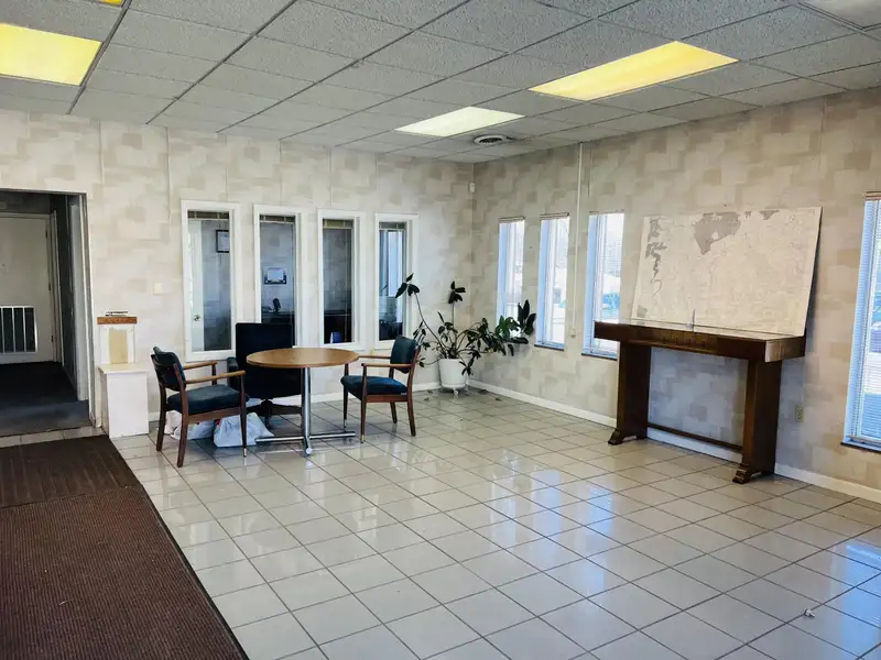 Historic Downtown Brick Building with Vault, Ideal for Office or Retail Conversion