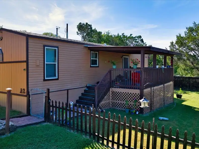 10-acre Mobile Home Community with 5 Units, Fenced, Workshop, and Growth Potential