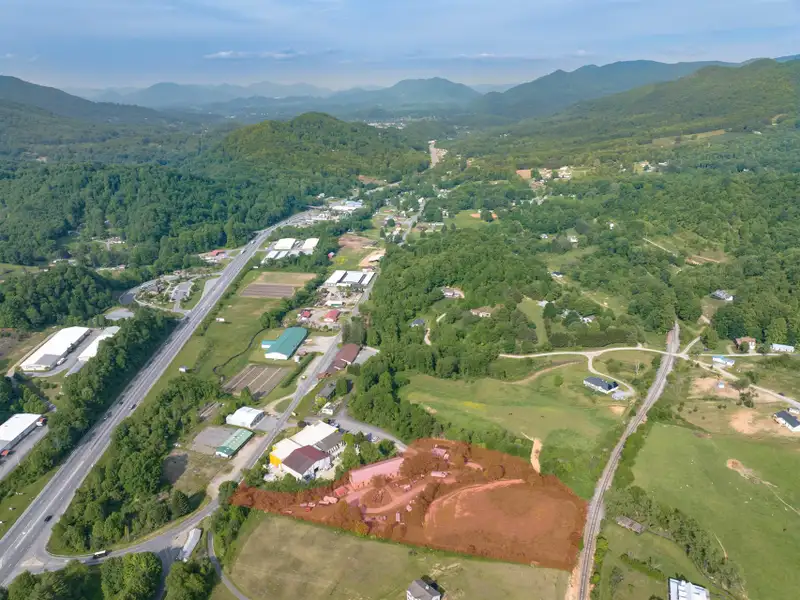 Historic 1918 Stone Building with 3.99 Acres and Detached Workshop in Balsam Road Area