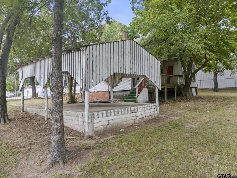 Prime Commercial Property with Building and Home on Half Acre Lot