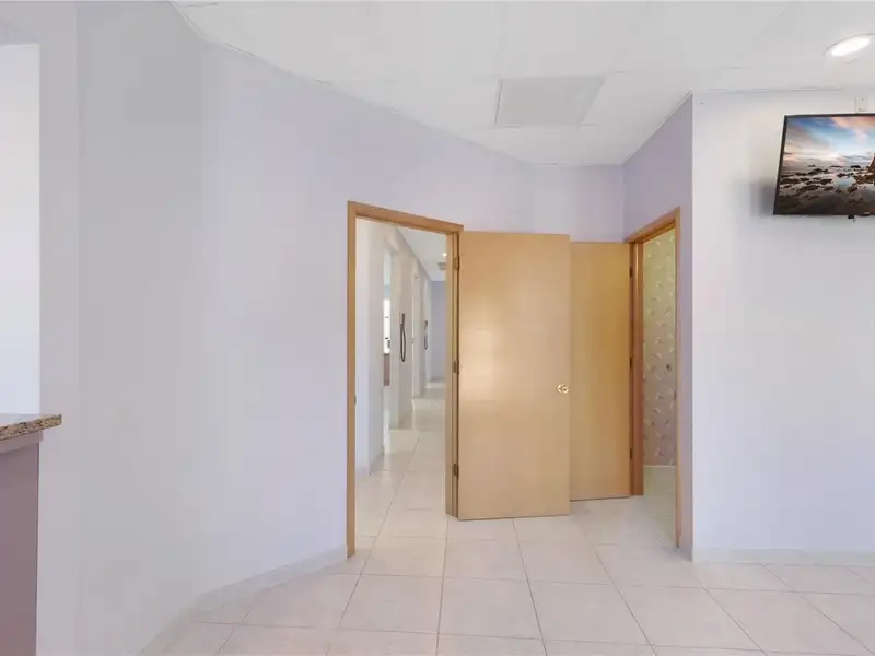 End Unit Tri-plex Commercial Space with Parking in Prime Location
