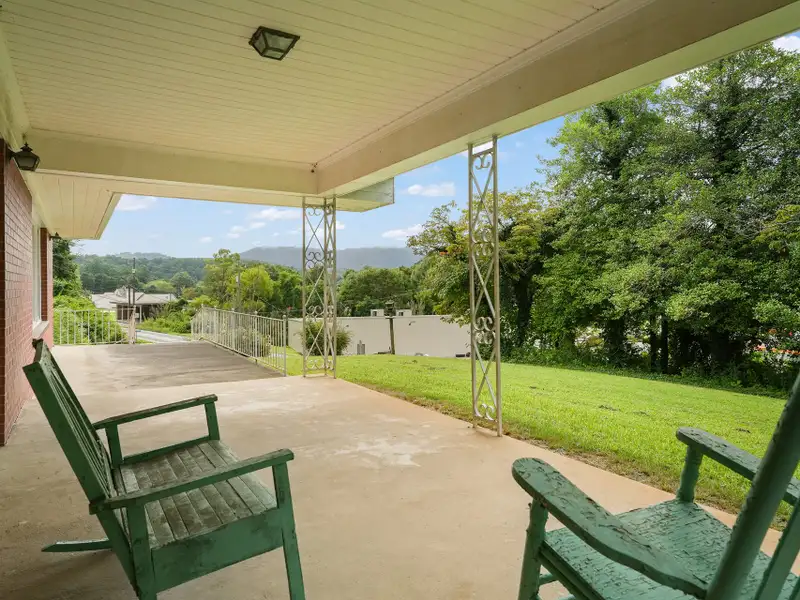 Prime 2.58-acre Multifunctional Property with Ranch Home and Outbuildings Near High-traffic Area