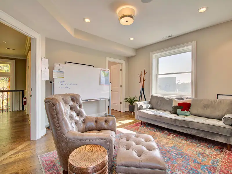Renovated Commercial Building with Office Space and Parking in Historic Location