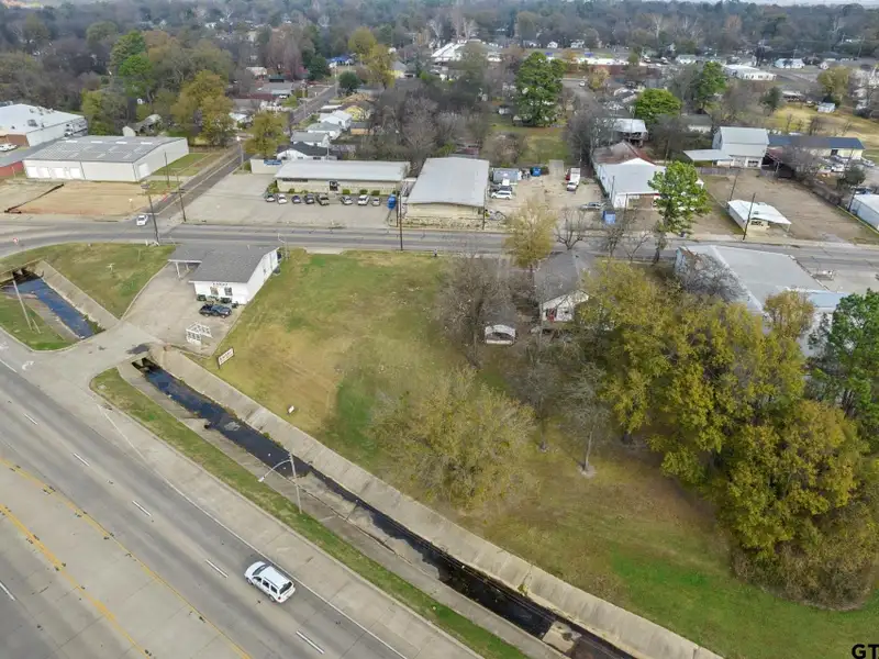 Prime Commercial Property with Building and Home on Half Acre Lot