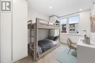 Renovated 2nd Floor Condo in Mid-town Toronto with Luxury Finishes and Modern Amenities