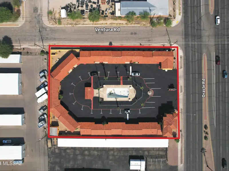 25-room Block Construction Property in Opportunity Zone with Kitchenettes and Potential for Expansion