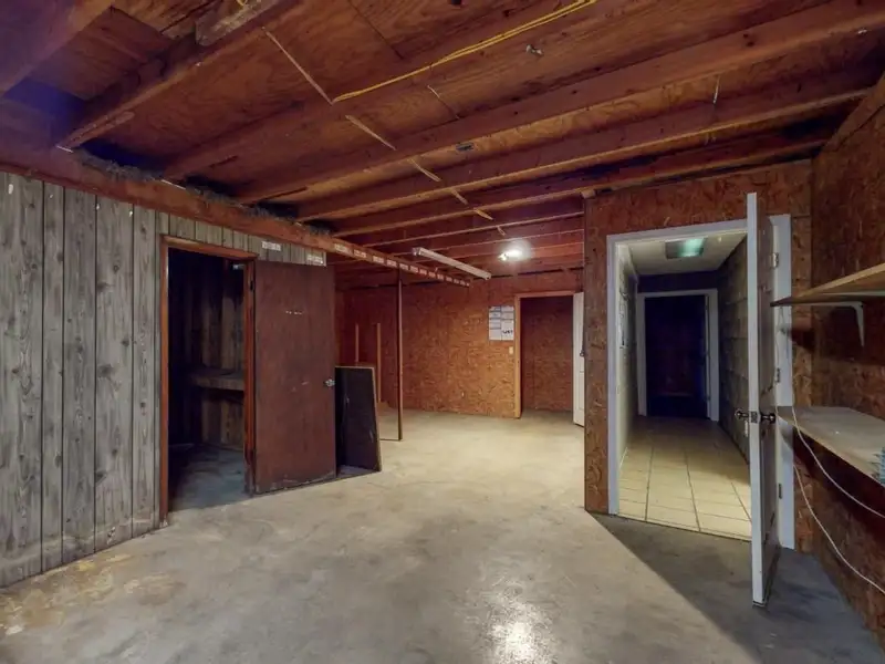 Commercial Property on Busy Highway - 2.1 Acres, 31,000 Sq Ft with Offices and Roll-up Doors