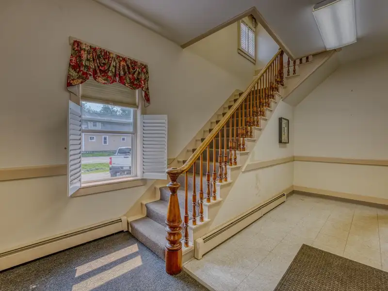 Versatile Mixed-use Property on Cottage Street, Littleton with Office Spaces and Barn