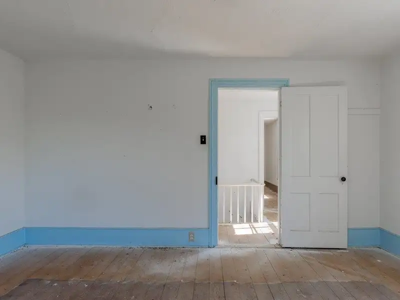 Classic American Foursquare Home in Need of Restoration with Detached Garage