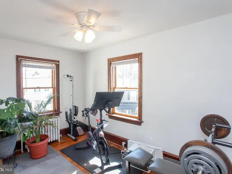 Multi-unit Building with Commercial Space and Two Residential Apartments in Established Location