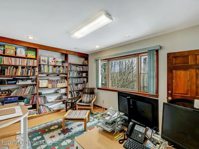 Versatile Former Church Building in Peaceful Location with Ample Parking and Creative Potential