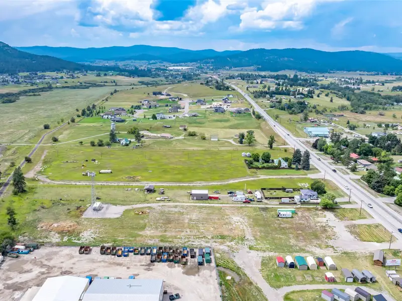 Flexible Development Site with Highway 2 Access and Income-generating Cell Tower