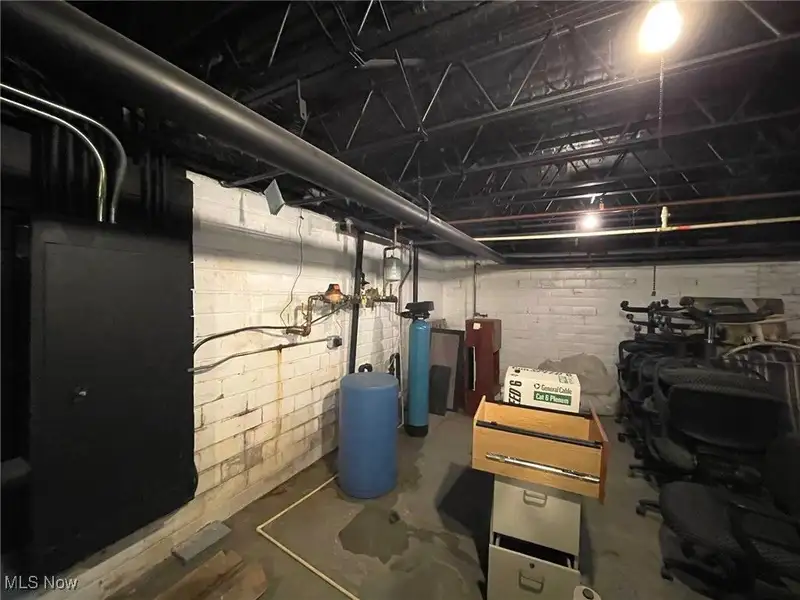 Well-maintained Two-story Brick Building with Retail and Workshop Space in Ne Location