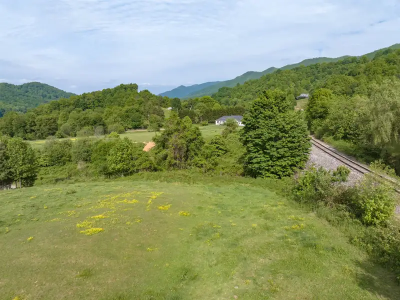 Historic 1918 Stone Building with 3.99 Acres and Detached Workshop in Balsam Road Area