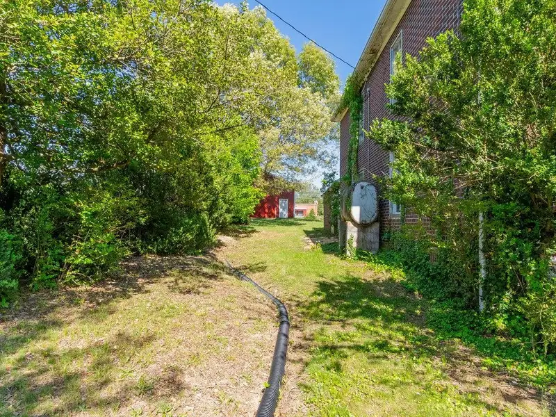 Classic American Foursquare Home in Need of Restoration with Detached Garage