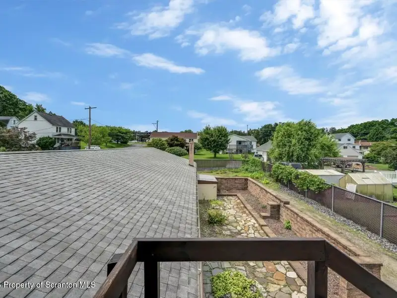 Mixed-use Property in Throop: 7-bay Garage and Updated 2-bedroom Apartment